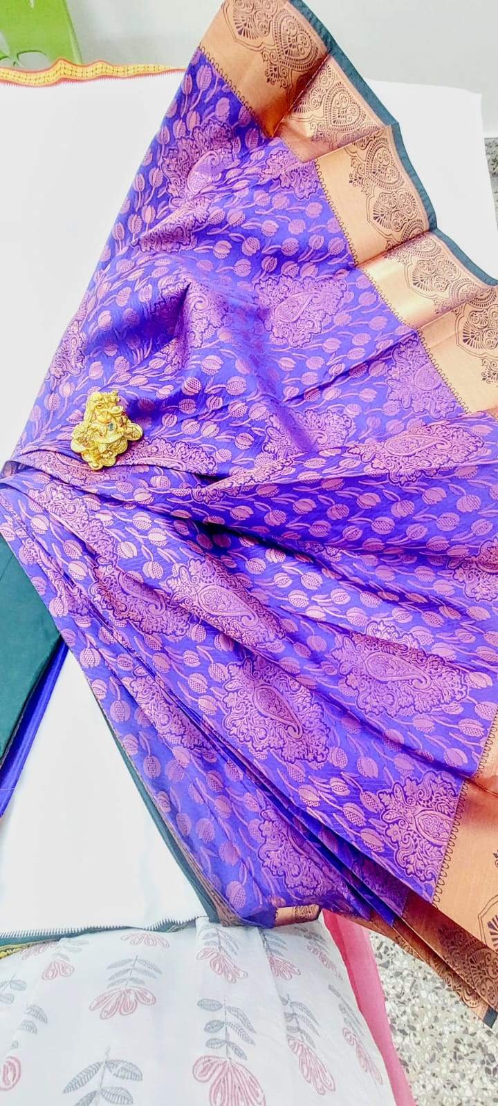 Soft silk saree with copper zari border and zari floral design